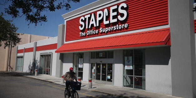 MIAMI, FL - FEBRUARY 03: The sign logo for a Staples store is seen on February 3, 2015 in Miami, Florida. Reports indicate that Office Depot and Staples are in talks to merge. (Photo by Joe Raedle/Getty Images)