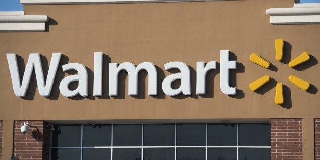 A Walmart store is seen in Landover, Maryland, December 31, 2014. The accidental fatal shooting of a US woman by her own two-year-old son at a Walmart store has left her family devastated and again raised questions about gun safety in America. Veronica Rutledge was out shopping with her son and three nieces on December 30, 2014 in Hayden, Idaho when the child unzipped her handbag -- specially designed to carry a concealed weapon -- and the gun went off. The 29-year-old nuclear research scientist, who held a concealed-carry permit, got the bag last week as a Christmas gift from her husband Colt Rutledge, with whom she shared a passion for guns. 'An inquisitive two-year-old boy reached into the purse, unzipped the compartment, found the gun and shot his mother in the head,' her father-in-law Terry Rutledge told the Washington Post newspaper. AFP PHOTO / SAUL LOEB (Photo credit should read SAUL LOEB/AFP/Getty Images)