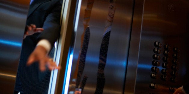 Hands of businessman entering elevator