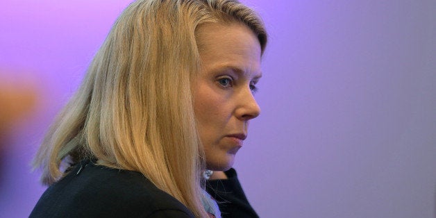 Marissa Mayer, chief executive officer of Yahoo! Inc., listens to a speaker during a session on the final day of the World Ec