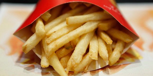 A packet of french fries sit on a tray in this arranged photograph at a McDonald's restaurant, operated by McDonald's Holdings Co. Japan Ltd., in Tokyo, Japan, on Wednesday, Jan.7, 2015. McDonald's Corp.'s Japan business and Cargill Inc. are investigating complaints objects were found in chicken nuggets made by a Cargill factory in Thailand, the restaurant chainÃ¢s second food safety crisis in six months. Photographer: Kiyoshi Ota/Bloomberg via Getty Images