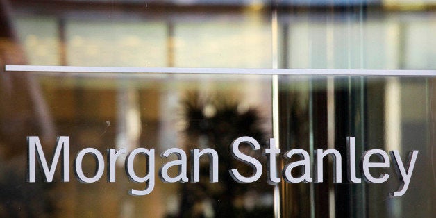 The Morgan Stanley logo is shown on its Times Square building, Tuesday, Oct. 18, 2011 in New York. Morgan Stanley said Wednesday, Oct. 19, 2011, it earned $2.2 billion in the third quarter, largely on accounting gains and increased investment banking revenue. (AP Photo/Mark Lennihan)