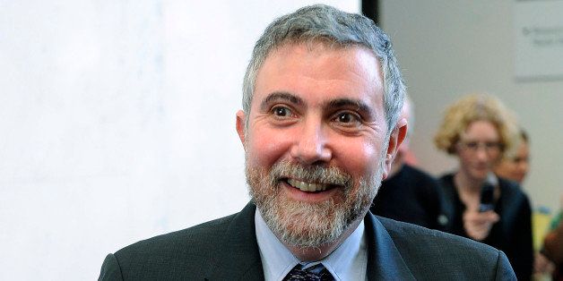 PRINCETON, NJ - OCTOBER 13: Princeton Professor and New York Times columnist Paul Krugman smiles after a champagne toast in his honor following a press conference to announce his winning the Nobel Prize October 13, 2008 in Princeton, New Jersey. Krugman was given the prestigious award, which includes a prize of $1.4 million for his work on economic trade theory. (Photo by Jeff Zelevansky/Getty Images)