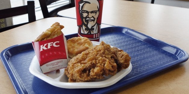 A fried chicken meal is seen at a KFC restaurant in Somerville, Mass., Tuesday, July 14, 2009. Yum! Brands, the operator of Pizza Hut, Taco Bell and KFC said Tuesday its profit jumped 35 percent in its fiscal second quarter on strong growth overseas, an improved tax rate and increased ownership in its business in China. (AP Photo/Michael Dwyer)