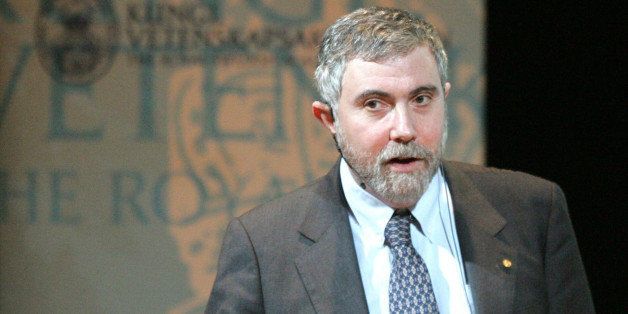 Paul Krugman of Princeton University, winner of the Nobel Prize in Economics for 2008, holds his Nobel lecture at the Aula Magna of the Stockholm University, in Stockholm, Monday Dec. 8, 2008. Logotype of Swedish Academy of Sciences is in the background. (AP Photo/Fredrik Persson, Scanpix Sweden) ** SWEDEN OUT **