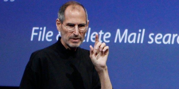 Apple Inc. Chairman and CEO Steve Jobs gestures on stage during an event in Cupertino, Calif., Thursday, April 8, 2010. (AP Photo/Eric Risberg)