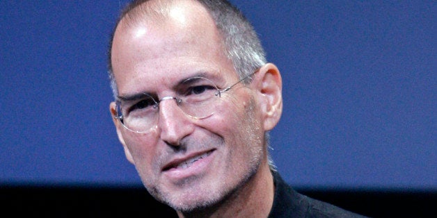 FILE - In this Oct. 14, 2008 file photo, Apple CEO Steve Jobs smiles during a product announcement at Apple headquarters in Cupertino, Calif. Jobs is on food website TheDailyMeal's "50 most powerful food folk in America" list. (AP Photo/Paul Sakuma, file)