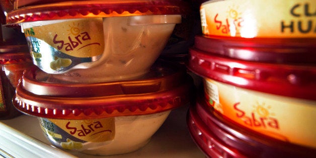 PepsiCo Inc. Sabra brand hummus are displayed for sale at a ShopRite Holdings Ltd. grocery store in Stratford, Connecticut, U.S., on Wednesday, Aug. 3, 2011. PepsiCo Inc. reported growth for the second quarter of 2011 partly due to the acquisition of Wimm-Bill-Dann, the leading dairy and juice company in Russia. Photographer: Paul Taggart/Bloomberg via Getty Images