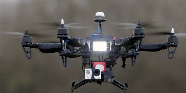 FILE - In this Monday Feb. 9, 2015 file photo, French company Malou Tech's "Army" speed drone mounted with a Go pro Hero3 performs during a demonstration flight in La Queue-en-Brie, east of Paris, France. Paris police say they spotted at least five drones flying over the French capital overnight Tuesday Feb.24, 2015, and an investigation is under way into who was flying them and why. Franceâs BFM television reported that they were seen flying over the Eiffel Tower, the Louvre Museum and the American Embassy, among other locations. (AP Photo/Francois Mori, File)