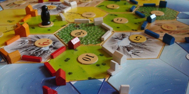 <a href="http://en.wikipedia.org/wiki/Settlers_of_Catan">Settlers of Catan</a> + <a href="http://en.wikipedia.org/wiki/Seafar