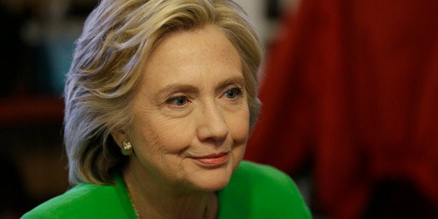 Democratic presidential candidate Hillary Rodham Clinton meets with local residents at the Jones St. Java House, Tuesday, April 14, 2015, in LeClaire, Iowa. (AP Photo/Charlie Neibergall)