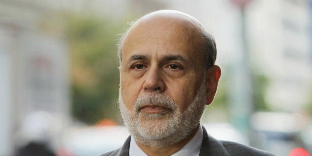 WASHINGTON, DC - OCTOBER 09: Former Chairman of the Federal Reserve Ben Bernanke arrives at U.S. Court of Federal Claims to testify at the AIG trial October 9, 2014 in Washington, DC. The trial is the result of a class action lawsuit brought against the US government by shareholders of AIG claiming that the government violated their rights by grabbing a majority stake in the company as part of the bailout of AIG in 2008. (Photo by Alex Wong/Getty Images)