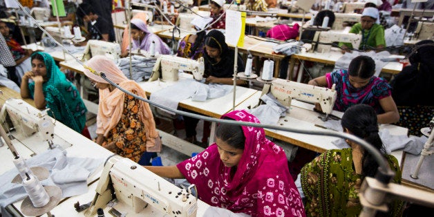 Workers sew garments on the production line of the Protik Apparels garment factory in Dhaka, Bangladesh, on Monday, April 29,