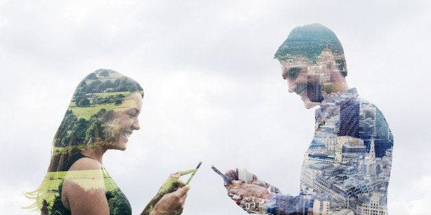 Double exposure of a man and woman using smart phones in different locations. One in the countryside and one in the city.