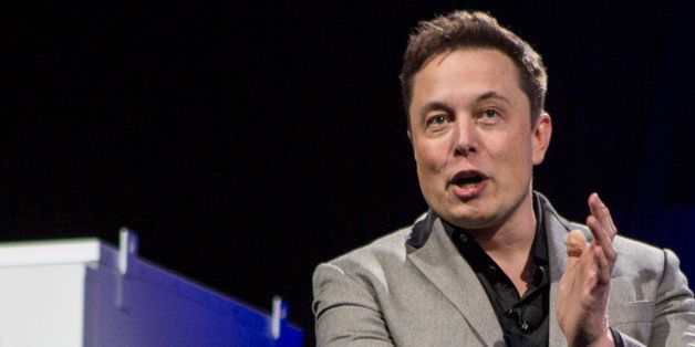 Elon Musk, CEO of Tesla Motors Inc., unveils the company's newest product, Powerpack in Hawthorne, Calif., Thursday, April. 30, 2015. (AP Photo/Ringo H.W. Chiu)