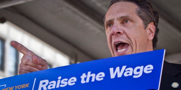 Gov. Andrew Cuomo speaks during a labor rally, announcing a plan to get a minimum $15 an hour wage hike for fast-food workers, Thursday, May 7, 2015, in New York. Cuomo is proposing a plan to get a minimum wage hike that doesn't require legislative approval. Cuomo said he will direct the state labor commissioner to examine the minimum wage in the fast-food industry. (AP Photo/Bebeto Matthews)