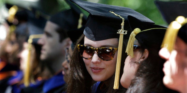 Students talk during Princeton University's graduation ceremonies Tuesday, June 4, 2013 in Princeton, N.J. Princeton awarded degrees to 2,158 undergraduate and graduate students. (AP Photo/Mel Evans)