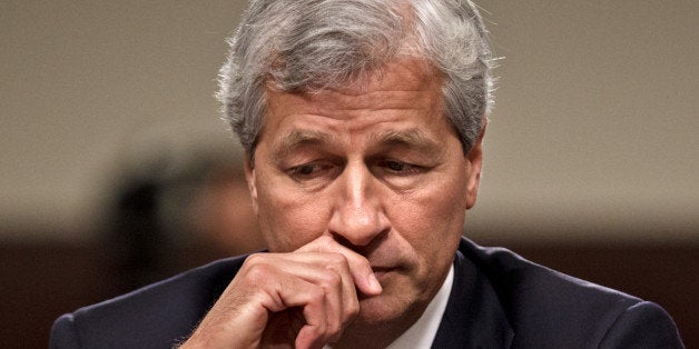 FILE - In this Wednesday, June 13, 2014, file photo, JPMorgan Chase CEO Jamie Dimon testifies on Capitol Hill in Washington.