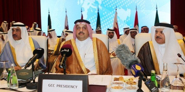 Kuwaiti Foreign Minister Sheikh Sabah al-Khaled al-Sabah (L), Qatari Foreign Minister Khalid bin Mohamed al-Attiyah (C) and Gulf Cooperation Council (GCC) secretary general Abdullatif al-Zayani attend the 24th session of the GCC-EU ministerial council meeting on May 24, 2015 in the Qatari capital Doha. AFP PHOTO / AL-WATAN DOHA / KARIM JAAFAR == QATAR OUT == (Photo credit should read KARIM JAAFAR/AFP/Getty Images)