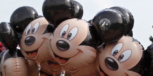 Ballons featuring Mickey Mouse are seen at Disneyland Paris, in Chessy, France, est of Paris, Tuesday, May 12, 2015. (AP Photo/Michel Euler)