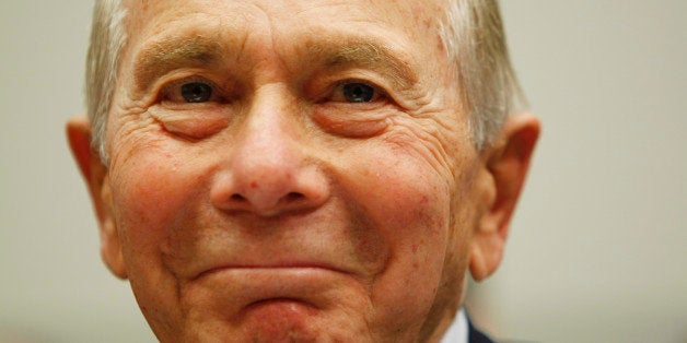 FILE - In this April 2, 2009 file photo, former AIG Chairman Hank Greenberg smiles on Capitol Hill in Washington prior to testifying before the House Oversight Committee. American International Group Inc. on Wednesday, Nov. 25, 2009 said it reached an agreement to settle all legal disputes with Greenberg. (AP Photo/Gerald Herbert, File)