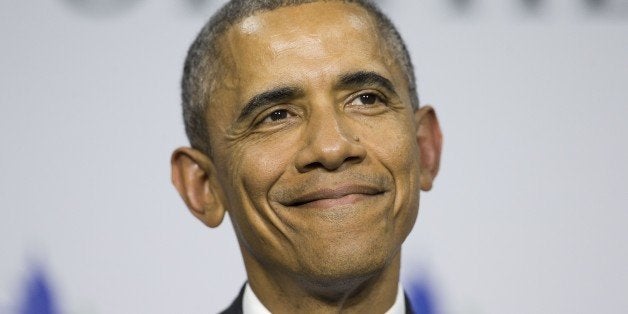 U.S. President Barack Obama smiles as he takes questions during his news conference at the Summit of the Americas in Panama City, Panama, Saturday, April 11, 2015. (AP Photo/Pablo Martinez Monsivais)