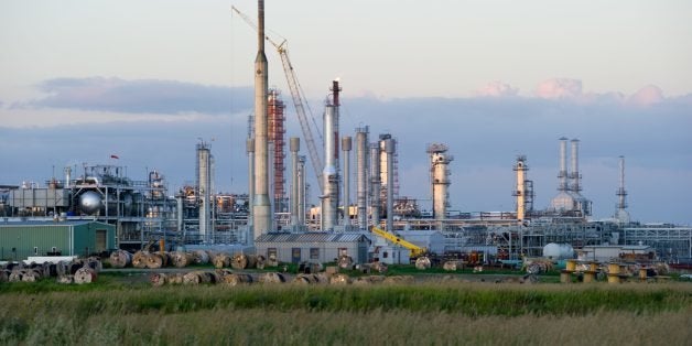 Photo taken August 20, 2013 shows the Hess Gas Plant in Tioga, North Dakota, a facility that is currently being expanded. Formerly Amarada Hess, the global company adopted 'Hess Corporation' in 2007. The name is synonymous with oil development in North Dakota, as it was Hess who first discovered oil in this state in 1951 at a well not far from this now bustling community. When the expansion is finished, the amount of liquids processed will increase from 260,000 gallons daily to 2.5 million gallons per day. The breakdown will be 50 percent ethane, 30 percent propane, 15 percent butane and five percent natural gasoline. AFP PHOTO / Karen BLEIER (Photo credit should read KAREN BLEIER/AFP/Getty Images)