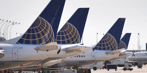 CHICAGO, IL - SEPTEMBER 19: United Airlines jets sit at gates at O'Hare International Airport on September 19, 2014 in Chicago, Illinois. In 2013, 67 million passengers passed through O'Hare, another 20 million passed through Chicago's Midway Airport, and the two airports combined moved more than 1.4 million tons of air cargo. (Photo by Scott Olson/Getty Images)