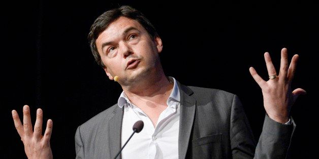 FILE - In this June 30, 2014 file photo, French economist Thomas Piketty speaks during his seminar at the Almedalen political week in Visby on the island of Gotland, in Sweden. Novelist Marilynne Robinson, economist Piketty and cartoonist Roz Chast are among the finalists for National Book Critics Circle prizes. The 30 nominees for six competitive categories were announced Monday, Jan. 19, 2015. (AP Photo/Janerik Henriksson, File) SWEDEN OUT
