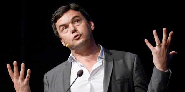 FILE - In this June 30, 2014 file photo, French economist Thomas Piketty speaks during his seminar at the Almedalen political week in Visby on the island of Gotland, in Sweden. Novelist Marilynne Robinson, economist Piketty and cartoonist Roz Chast are among the finalists for National Book Critics Circle prizes. The 30 nominees for six competitive categories were announced Monday, Jan. 19, 2015. (AP Photo/Janerik Henriksson, File) SWEDEN OUT