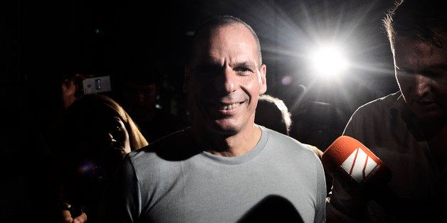 ATHENS, GREECE - JULY 05: Greek Finance Minister Yanis Varoufakis leaves his office as Greek voters are expected to vote no in the Greek austerity referendum, on July 5, 2015 in Athens, Greece. The people of Greece are going to the polls to decide if the country should accept the terms and conditions of a bailout with its creditors. Greek Prime Minister Alexis Tsipras is urging people to vote 'a proud no' to European creditors' proposals, and 'live with dignity in Europe'. 'Yes' campaigners believe that a no vote would mean financial ruin for Greece and the loss of the Euro currency. (Photo by Milos Bicanski/Getty Images)