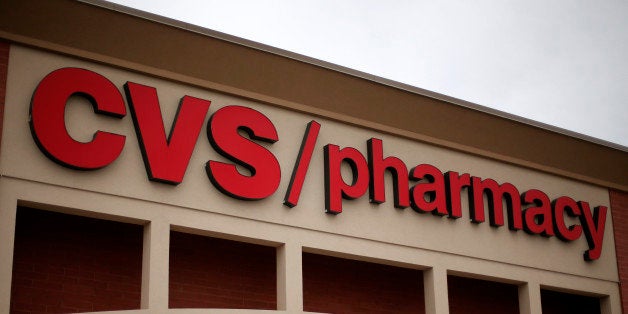 This March 17, 2014 photo shows a CVS/Pharmacy in Dormont, Pa. CVS Health reports quarterly financial results on Tuesday, Nov