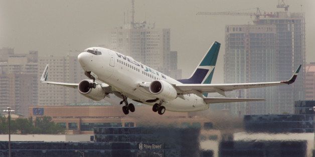 PEARSON AIRPORT---06/02/06---WestJet Airplanes take off, land and taxi around Pearson International Airport. June 2, 2006. (Photo by Steve Russell/Toronto Star via Getty Images)