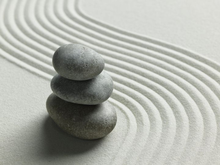zen stone in the sand....