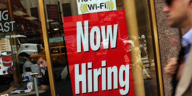 NEW YORK, NY - AUGUST 07: A 'now hiring' sign is viewed in the window of a fast food restaurant on August 7, 2012 in New York City. In a further sign that the American economy may be improving the U.S. labor Department said Tuesday that employers posted the most job openings in four years in June. The data comes after FridayÕs news that said employers in July added the most jobs in five months. (Photo by Spencer Platt/Getty Images)