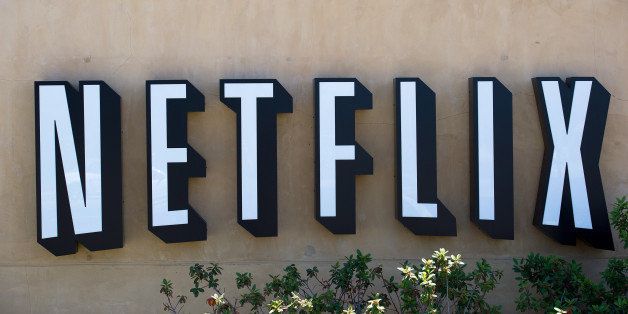 The Netflix Inc. logo is displayed at the entrance to the company's headquarters in Los Gatos, California, U.S., on Thursday, July 21, 2011. Neflix Inc. will be reporting their second quarter results on July 25 2011. Photographer: David Paul Morris/Bloomberg via Getty Images