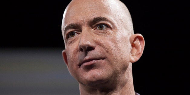 SEATTLE, WA - JUNE 18: Amazon.com founder and CEO Jeff Bezos presents the company's first smartphone, the Fire Phone, on June