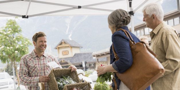 Older couple shopping at farmers market