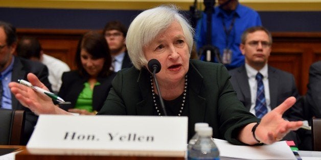 Federal Reserve Chairwoman Janet Yellen Testifies before the House Financial Committee July 15, 2015 on Capitol Hill in Washington, DC. Yellen stuck to her forecast for an increase in the Fed's key interest rate later this year on Wednesday, predicting a pickup in the US economy. But Yellen also warned that continued turbulence from Greece and China poses risks to the US growth picture. In prepared testimony to Congress, Yellen said that the labor market still showed 'some' slack, suggesting accommodative monetary policy from the US central bank was still merited despite the unemployment rate falling to 5.3 percent. AFP PHOTO/PAUL J. RICHARDS (Photo credit should read PAUL J. RICHARDS/AFP/Getty Images)