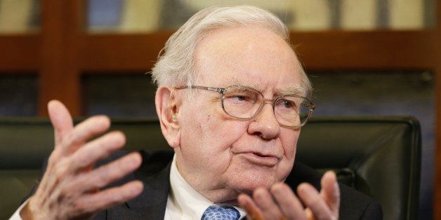 Berkshire Hathaway Chairman and CEO Warren Buffett gestures during an interview with Liz Claman on the Fox Business Network in Omaha, Neb., Monday, May 5, 2014. The annual Berkshire Hathaway shareholders meeting concluded over the weekend. (AP Photo/Nati Harnik)