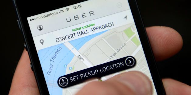 File photo dated 11/06/14 of the Uber app being used, as the taxi app lashed out against planned proposals affecting cab drivers.