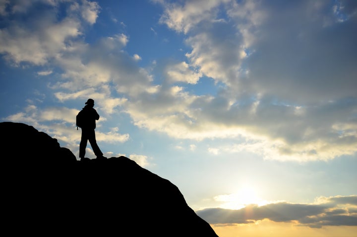 man on top of the mountain...