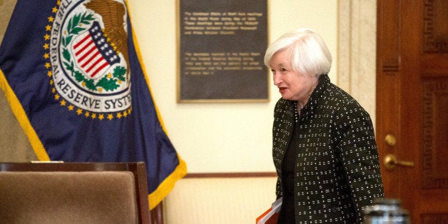 Federal Reserve Chair Janet Yellen arrives at a Board of Governors meeting to discuss a final rule to implement the Dodd-Fran