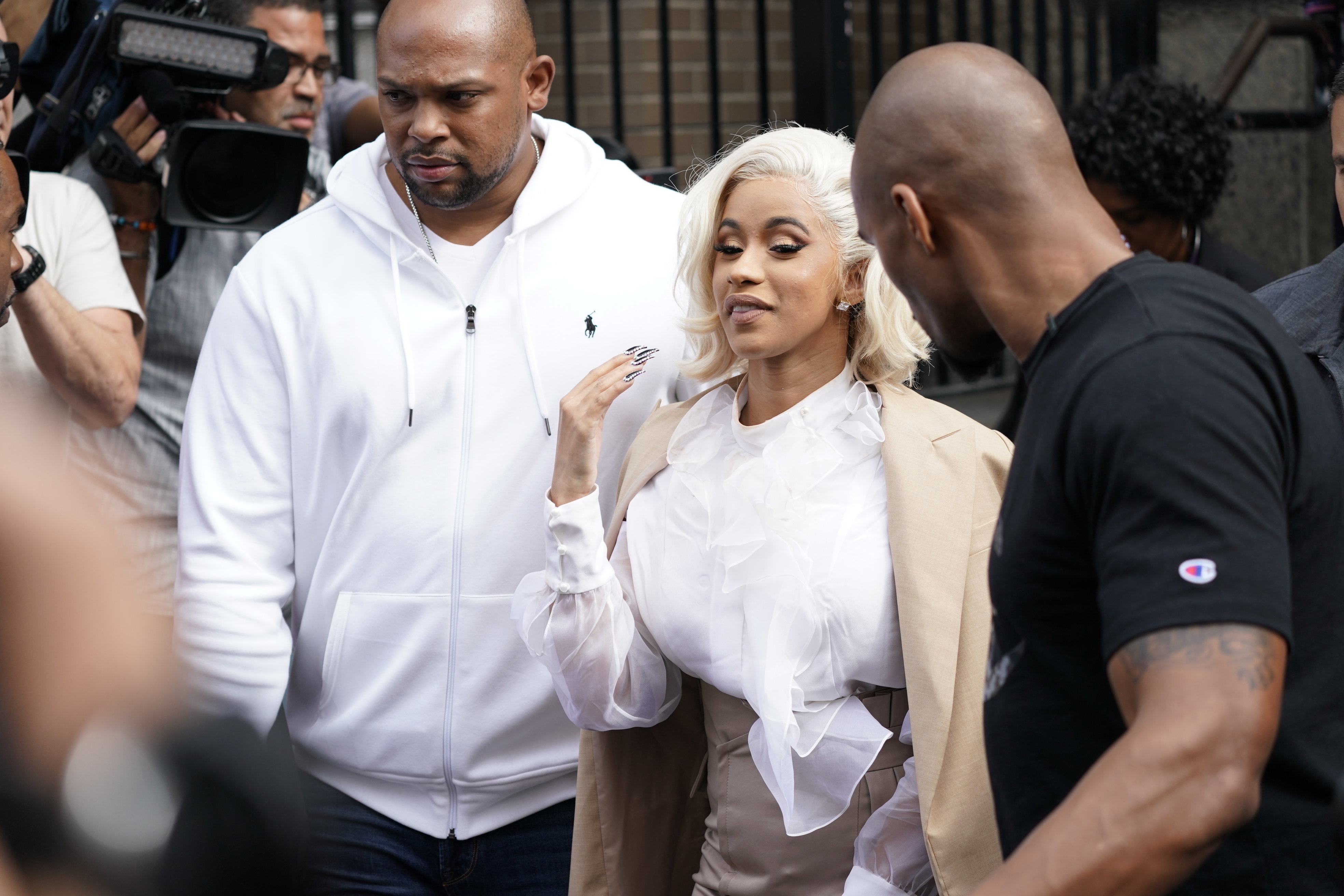 Cardi B Charged After Handing Herself Into Police Following Nightclub ...