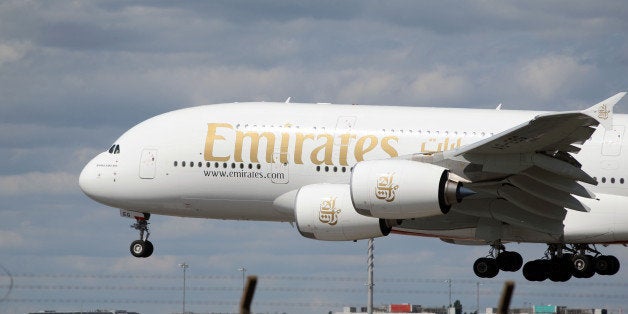 A Emirates Airbus A380 plane lands at Heathrow Airport