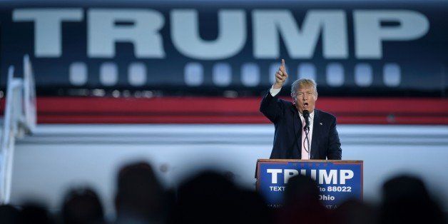 US presidential hopeful Donald Trump speaks during a rally March 14, 2016 in Vienna Center, Ohio.The six remaining White House hopefuls made a frantic push for votes March 14, 2016 on the eve of make-or-break nominating contests, with Donald Trump's Republican rivals desperate to bar his path after a weekend of violence on the campaign trail. / AFP / Brendan Smialowski (Photo credit should read BRENDAN SMIALOWSKI/AFP/Getty Images)