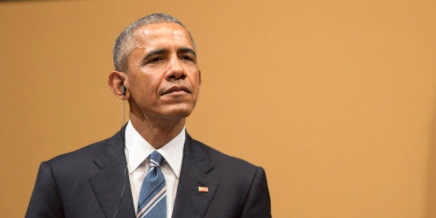 President Barack Obama listens during a joint news conference with Cuban President Raul Castro at the Palace of the Revolution, Monday, March 21, in Havana, Cuba. (New York Times Photo/Pablo Martinez Monsivais)