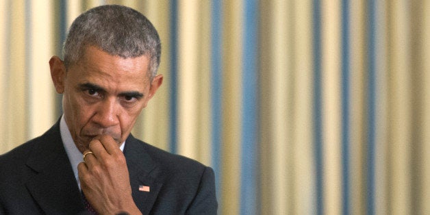 WASHINGTON, DC - MARCH 30: U.S. President Barack Obama listens as Vice President Joe Biden speaks during the Easter Prayer Breakfast at the White House on March 30, 2016 in Washington, D.C. (Photo by Kevin Dietsch-Pool/Getty Images)