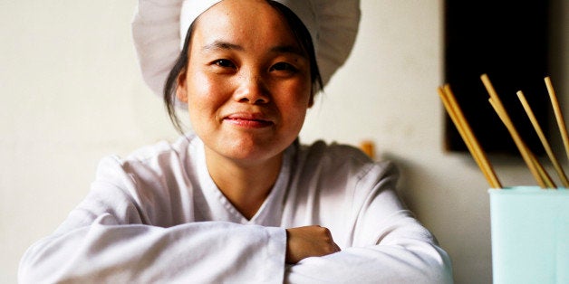 Close-up of chef with chopsticks