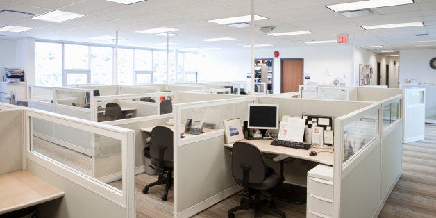 empty office space with cubicles and natural light